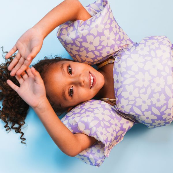 Swim Essentials Puddle Jumper - 2-6 Years / 15-30 Kg - Purple Flowers Swim Essentials Puddle Jumper - 2-6 Years / 15-30 Kg - Purple Flowers